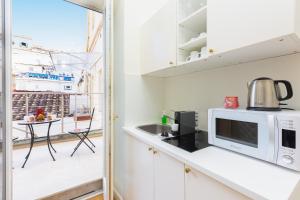 Köök või kööginurk majutusasutuses Amazing Piazza Venezia Suites