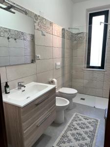 Kylpyhuone majoituspaikassa Casa Bettina la Maddalena
