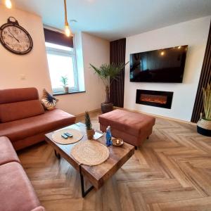 Зона вітальні в Apartament w Tucholi