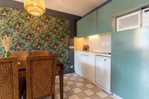 Kuchyňa alebo kuchynka v ubytovaní Superb bohemian flat for 6 pers in the heart of the Equestrian centre 164