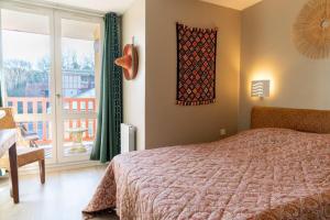 Posteľ alebo postele v izbe v ubytovaní Superb bohemian flat for 6 pers in the heart of the Equestrian centre 164