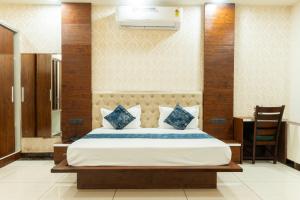 Postel nebo postele na pokoji v ubytování KK Residency