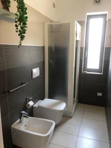 Koupelna v ubytování BE HOME Fiera
