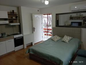 Kuchyň nebo kuchyňský kout v ubytování Apartman Happy 3