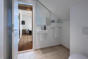 Kopalnica v nastanitvi Hotel Scheelsminde