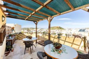 A balcony or terrace at Historic Hideaways - 900 Year Old Converted Studios