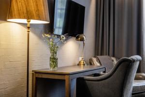 TV a/nebo společenská místnost v ubytování Hotel Scheelsminde