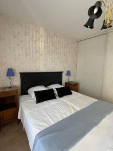 Postel nebo postele na pokoji v ubytování Le Repère appartement centre-ville
