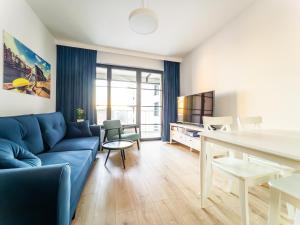 Posedenie v ubytovaní Apartament z dwiema sypialniami + parking