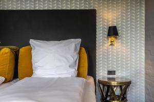 Postelja oz. postelje v sobi nastanitve Hotel Scheelsminde