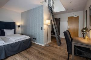 Postelja oz. postelje v sobi nastanitve Hotel Scheelsminde