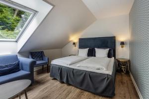 Postelja oz. postelje v sobi nastanitve Hotel Scheelsminde