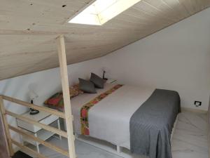 Postel nebo postele na pokoji v ubytování Team019 Casa Giusi 4 ospiti Catania