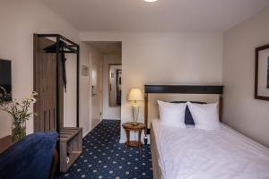 Postelja oz. postelje v sobi nastanitve Hotel Scheelsminde