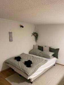 Ένα ή περισσότερα κρεβάτια σε δωμάτιο στο Gesamtes Haus mit Garten - 100% Privatsphäre