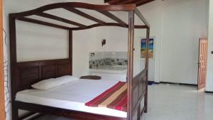 Кровать или кровати в номере Ileesha Guest & Villa