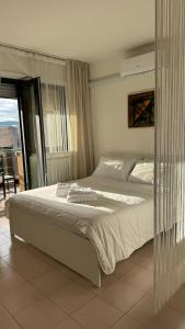 Postel nebo postele na pokoji v ubytování Casa Valentina 3