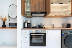 A kitchen or kitchenette at Stars 1-Bedroom Apartment in Larnaca