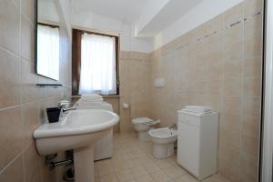 Kúpeľňa v ubytovaní Residence Sole del Conero + 21 fotografií