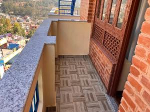 Balkón nebo terasa v ubytování Budhanilkantha Sacred Trails Kathmandu Homestay