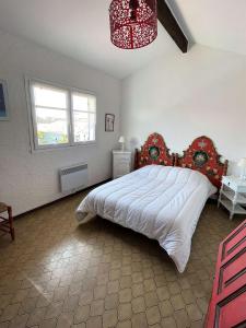 Posteľ alebo postele v izbe v ubytovaní Réf 277 Seignosse LES BOURDAINES , à proximité immédiate de la plage, Villa patio classée 2 étoiles , 8 personnes