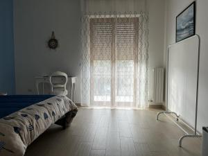 Postel nebo postele na pokoji v ubytování Appartamento AmareTrani