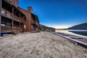 a large building on the shore of a lake at Studio Queen Room Ground Floor Unit 113 Bldg B in Truckee