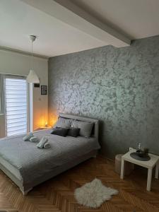 Kama o mga kama sa kuwarto sa Loli apartman