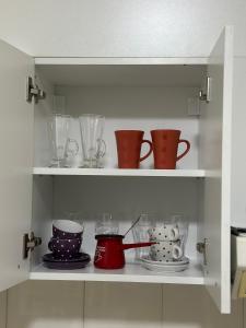 Kitchen o kitchenette sa Loli apartman