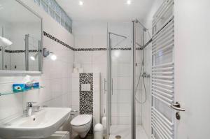 Ένα μπάνιο στο Hiddes Hus - Ferienwohnung Fuhrmann