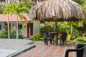 Zahrada ubytování Cabañas Orlando y Más Na' Tayrona