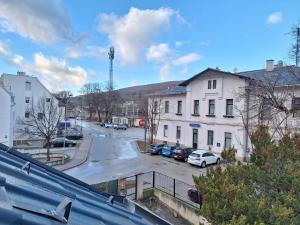 a view of a street with cars parked in a parking lot at Apartment Purkersdorf bei Wien Top 4 in Purkersdorf