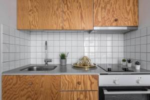 A cozinha ou kitchenette de Comfy Studio easy to commute