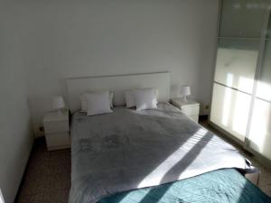 Ein Bett oder Betten in einem Zimmer der Unterkunft L'Erbetta fra le Cinque Terre e la Val di Vara