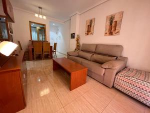 Ein Sitzbereich in der Unterkunft ACV - Costa Caribe II-2ª Linea Planta 4 Sur