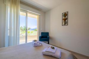 Postel nebo postele na pokoji v ubytování Residence A Marina