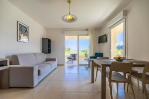 TV a/nebo společenská místnost v ubytování Residence A Marina