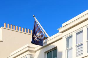 a flag on the side of a building at The Southern Belle in Brighton & Hove
