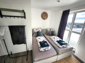 Katil atau katil-katil dalam bilik di Modernes Apartment mit WIFI, Aufzug & Kostenlos Parken EL-Living