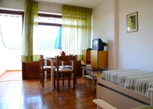 Postel nebo postele na pokoji v ubytování Residence Napoleon