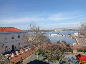 a view of a harbor with boats in the water at Seixal Yachting Bay Apartments in Seixal