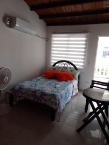Ліжко або ліжка в номері Espléndida Casa en la Ciudad de Santa Marta