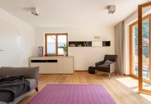 Posezení v ubytování Ferienhaus am Park