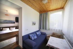 Postel nebo postele na pokoji v ubytování Gästehaus Lienharterhof