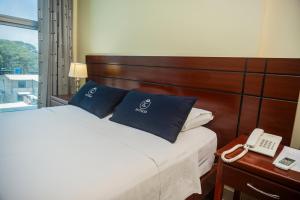 Posteľ alebo postele v izbe v ubytovaní LC Hoteles Piura