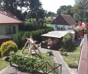 an aerial view of a house with a garden at "Pokoje u Ireny"-pokój brzoza 4 osobowy in Sztutowo