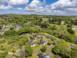 an aerial view of a homes in a subdivision at 3 Bed in St. Mellion 87711 in St. Mellion