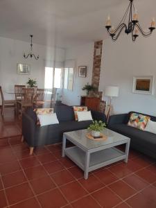 Posezení v ubytování Chalet Matalascañas