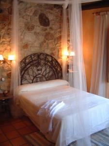 
Cama o camas de una habitación en Casa Rural El Fontano
