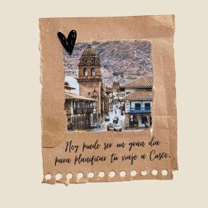 a card with a picture of a city at Qory Punku Villa Militar in Cusco